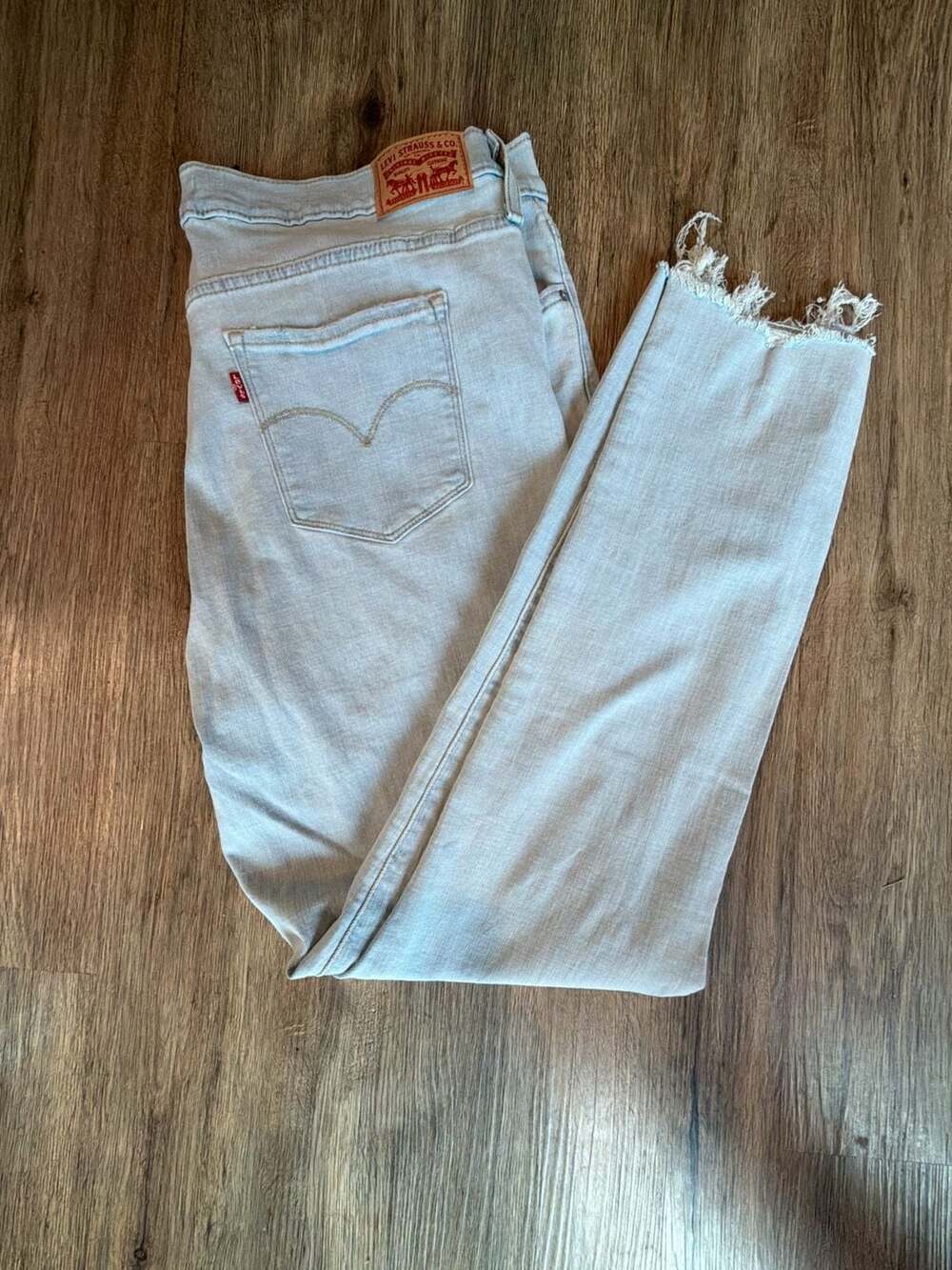 Levi's 311 Shaping Skinny Jeans Size 34 Light Wash Distressed Raw Hem